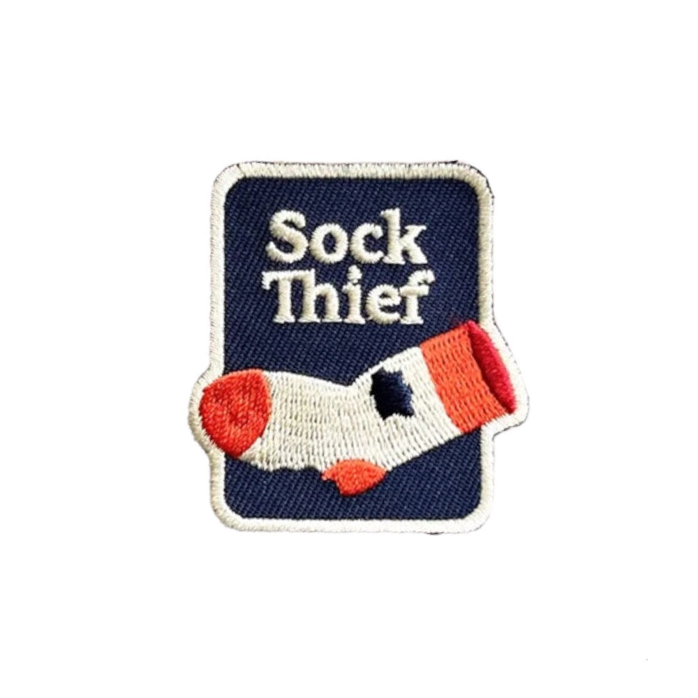 Badge de voleur de chaussettes